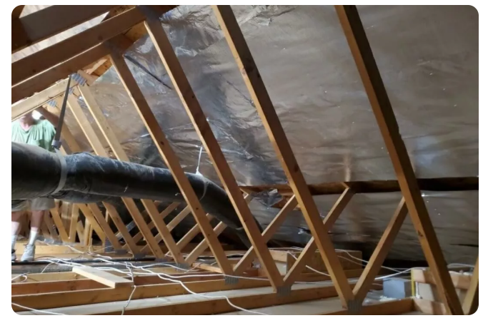 Attic insulation installation with ductwork and wiring